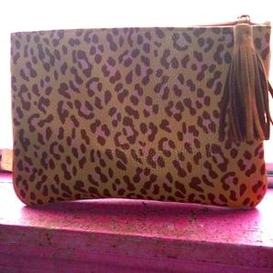 Pocket book/makeup bag with vest to go with it